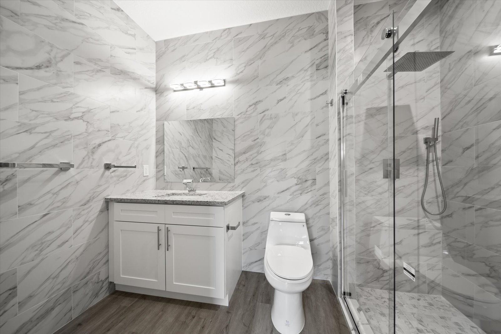 Bathroom with glass shower enclosure